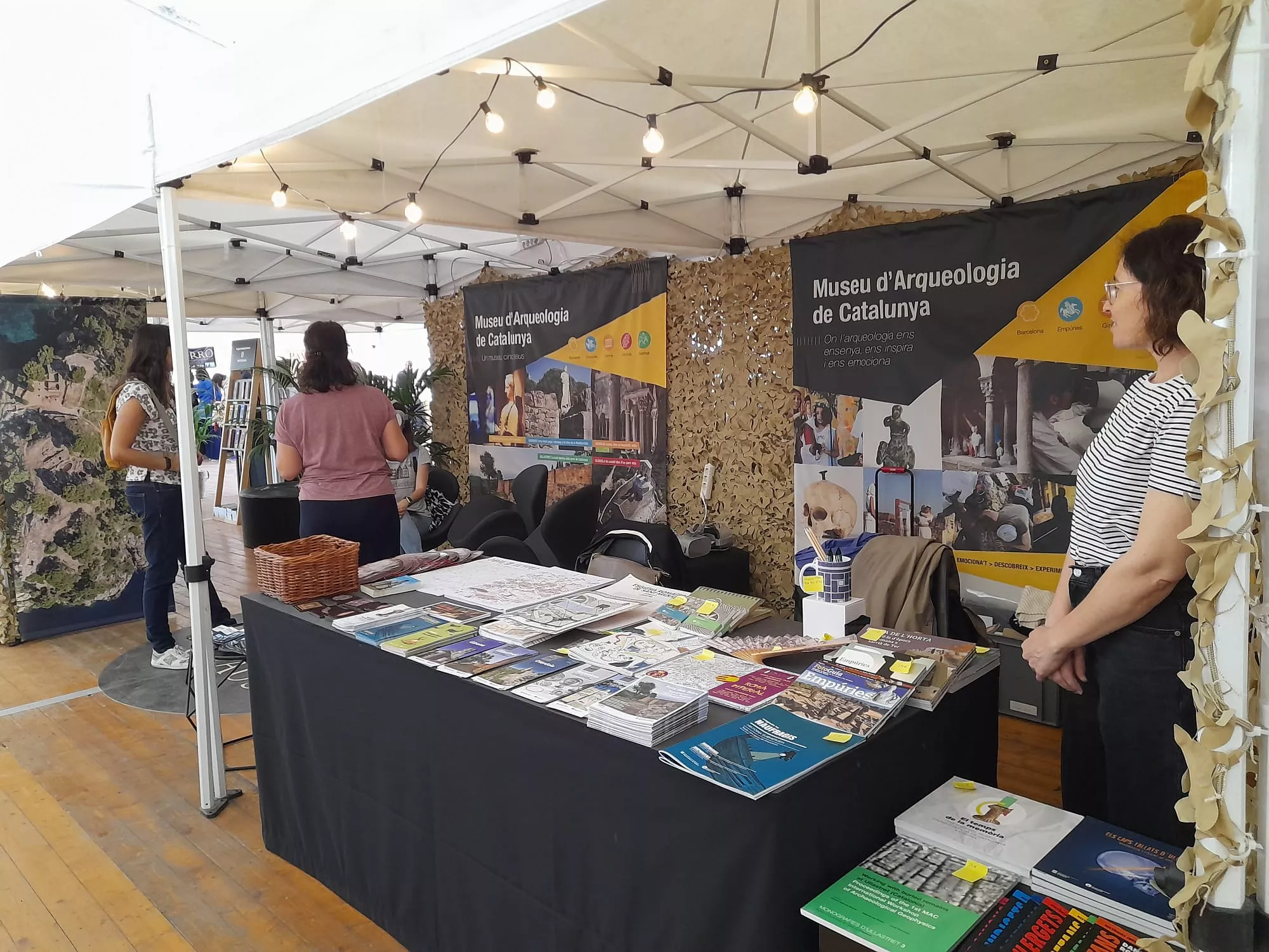 Estand del MAC a la fira 'Roma als museus del món' del festival Tarraco Viva